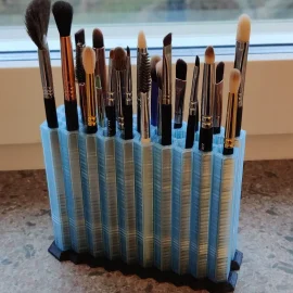 قاعدة لحمل فرش الميك آب