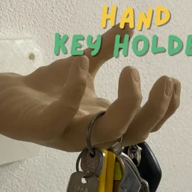 يد بشرية لتعليق المفاتيح